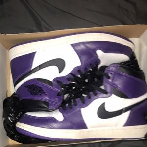 I am selling Jordan 1 color purple and black still brand new good style shoe.